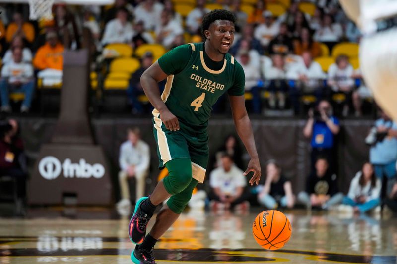 Jan 27, 2024; Laramie, Wyoming, USA; Colorado State Rams forward Isaiah Stevens (4) looks to pass against the Wyoming Cowboys during the second half at Arena-Auditorium. Mandatory Credit: Troy Babbitt-USA TODAY Sports