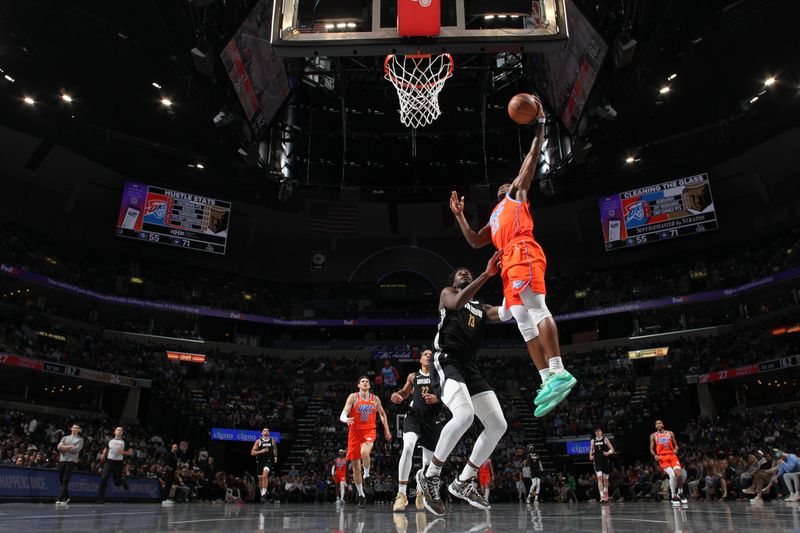 MEMPHIS, TN - MARCH 16: Cason Wallace #22 of the Oklahoma City Thunder  drives to the basket during the game against the Memphis Grizzlies on March 16, 2024 at FedExForum in Memphis, Tennessee. NOTE TO USER: User expressly acknowledges and agrees that, by downloading and or using this photograph, User is consenting to the terms and conditions of the Getty Images License Agreement. Mandatory Copyright Notice: Copyright 2024 NBAE (Photo by Joe Murphy/NBAE via Getty Images)