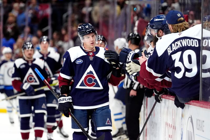 Dec 19, 2025; Denver, Colorado, USA; Colorado Avalanche center Parker Kelly (17) celebrates his go ahead goal in the third period against the Winnipeg Jets at Ball Arena. Mandatory Credit: Ron Chenoy-Imagn Images