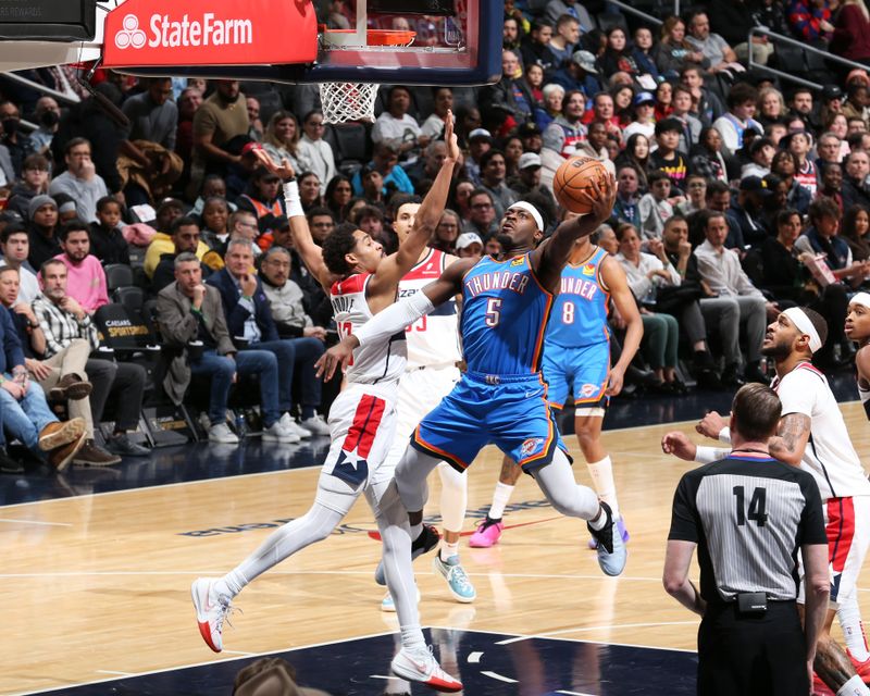 WASHINGTON, DC -? JANUARY 8: Luguentz Dort #5 of the Oklahoma City Thunder drives to the basket during the game against the Washington Wizards on January 8, 2024 at Capital One Arena in Washington, DC. NOTE TO USER: User expressly acknowledges and agrees that, by downloading and or using this Photograph, user is consenting to the terms and conditions of the Getty Images License Agreement. Mandatory Copyright Notice: Copyright 2024 NBAE (Photo by Stephen Gosling/NBAE via Getty Images)