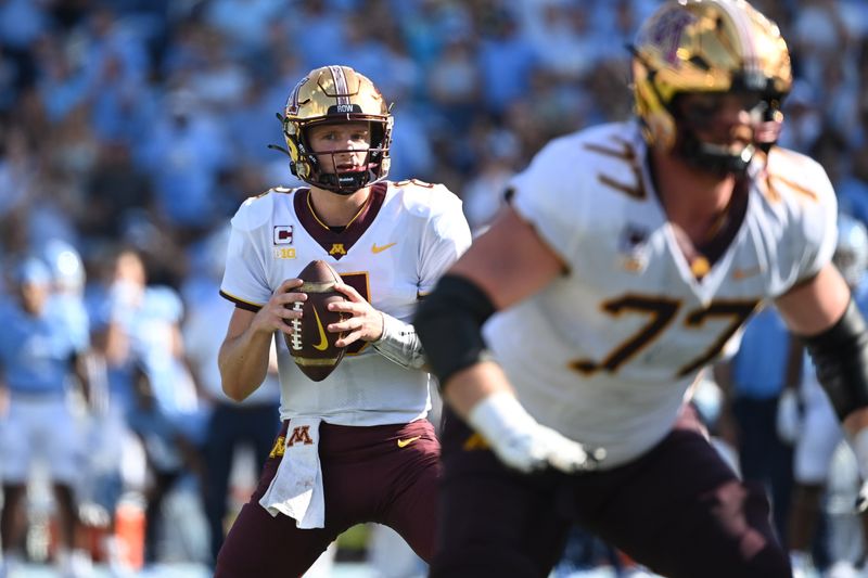 Sep 16, 2023; Chapel Hill, North Carolina, USA; Minnesota Golden Gophers quarterback Athan Kaliakmanis (8) looks to pass in the second quarter at Kenan Memorial Stadium. Mandatory Credit: Bob Donnan-USA TODAY Sports