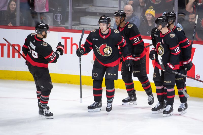 Mar 12, 2024; Ottawa, Ontario, CAN; Ottawa Senators defenseman Jake Batherson (85) celebrates his goal scored in the third period against the Pittsburgh Penguins at the Canadian Tire Centre. Mandatory Credit: Marc DesRosiers-USA TODAY Sports