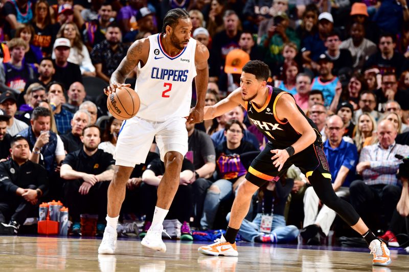 PHOENIX, AZ - APRIL 18: Kawhi Leonard #2 of the LA Clippers dribbles the ball during the game against the Phoenix Suns during Round 1 Game 2 of the 2023 NBA Playoffs on April 18, 2023 at Footprint Center in Phoenix, Arizona. NOTE TO USER: User expressly acknowledges and agrees that, by downloading and or using this photograph, user is consenting to the terms and conditions of the Getty Images License Agreement. Mandatory Copyright Notice: Copyright 2023 NBAE (Photo by Barry Gossage/NBAE via Getty Images)