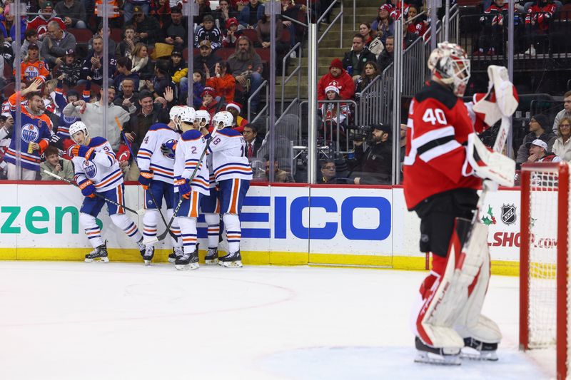 Dec 21, 2023; Newark, New Jersey, USA; Edmonton Oilers center Ryan Nugent-Hopkins (93) celebrates his goal against the New Jersey Devils during the first period at Prudential Center. Mandatory Credit: Ed Mulholland-USA TODAY Sports