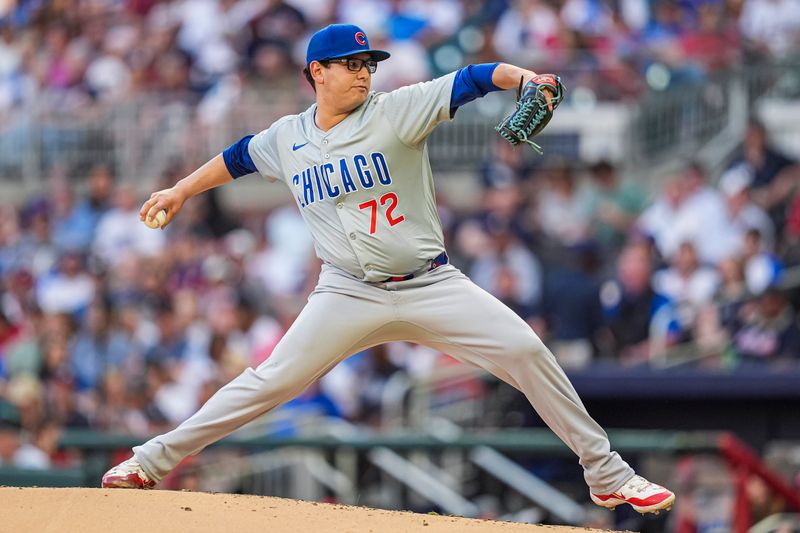 May 15, 2024; Cumberland, Georgia, USA; Chicago Cubs starting pitcher Javier Assad (72) pitches against the Atlanta Braves during the first inning at Truist Park. Mandatory Credit: Dale Zanine-USA TODAY Sports