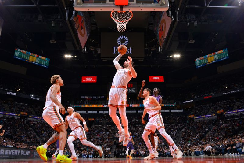 SAN ANTONIO, TX - MARCH 25: Cedi Osman #16 of the San Antonio Spurs rebounds the ball during the game against the Phoenix Suns on March 25, 2024 at the AT&T Center in San Antonio, Texas. NOTE TO USER: User expressly acknowledges and agrees that, by downloading and or using this photograph, user is consenting to the terms and conditions of the Getty Images License Agreement. Mandatory Copyright Notice: Copyright 2024 NBAE (Photos by Jesse D. Garrabrant/NBAE via Getty Images)