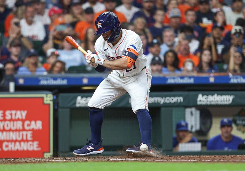 Aug 31, 2024; Houston, Texas, USA; Houston Astros second baseman Jose Altuve (27) is hit by a pitch during the sixth inning against the Kansas City Royals at Minute Maid Park. Mandatory Credit: Troy Taormina-USA TODAY Sports