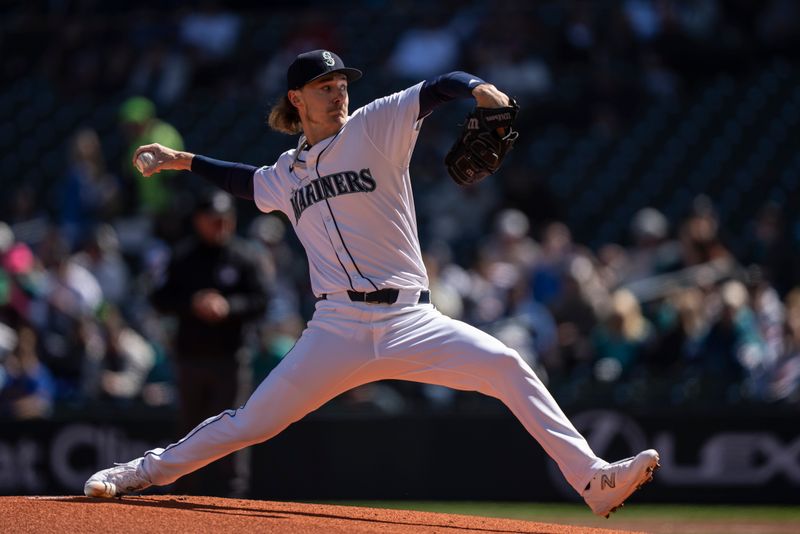 Apr 17, 2024; Seattle, Washington, USA; Seattle Mariners starter Bryce Miller (50) delivers a pitch first inning against the Cincinnati Reds at T-Mobile Park. Mandatory Credit: Stephen Brashear-USA TODAY Sports