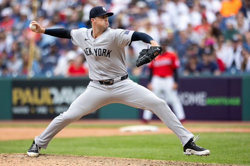 Apr 14, 2024; Cleveland, Ohio, USA; New York Yankees pitcher Clay Holmes (35) throws the ball during the ninth inning against the Cleveland Guardians at Progressive Field. Mandatory Credit: Scott Galvin-USA TODAY Sports