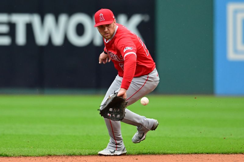 May 4, 2024; Cleveland, Ohio, USA; Los Angeles Angels second baseman Brandon Drury (23) fields a ball hit by Cleveland Guardians second baseman Andres Gimenez (not pictured) during the fourth inning at Progressive Field. Mandatory Credit: Ken Blaze-USA TODAY Sports