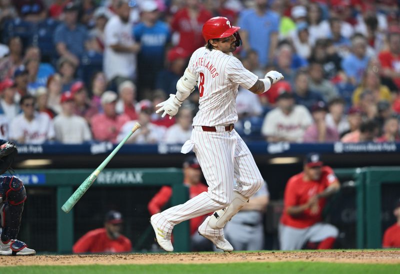 Aug 17, 2024; Philadelphia, Pennsylvania, USA; Philadelphia Phillies outfielder Nick Castellanos (8) hits an RBI double against the Washington Nationals in the fourth inning at Citizens Bank Park. Mandatory Credit: Kyle Ross-USA TODAY Sports