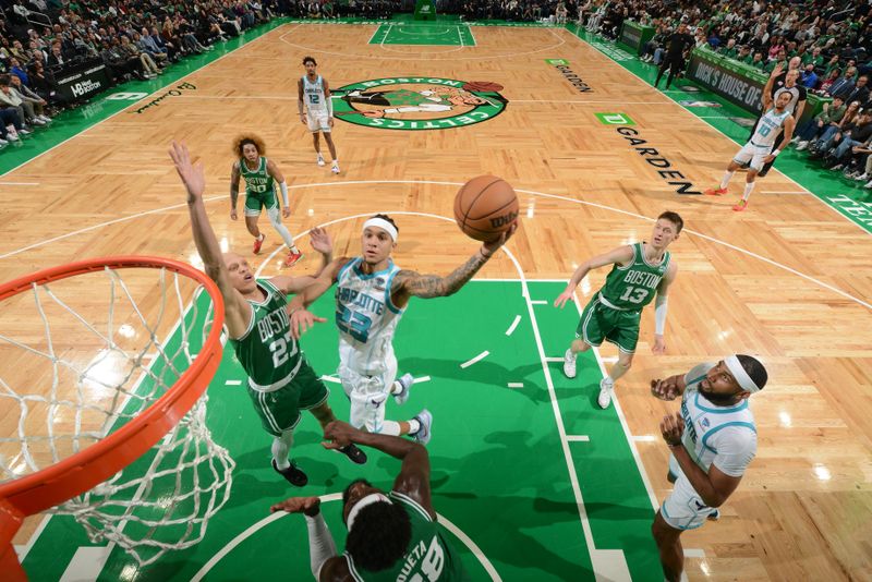 BOSTON, MA - APRIL 12:  Tre Mann #23 of the Charlotte Hornets drives to the basket during the game against the Boston Celtics on April 12, 2024 at the TD Garden in Boston, Massachusetts. NOTE TO USER: User expressly acknowledges and agrees that, by downloading and or using this photograph, User is consenting to the terms and conditions of the Getty Images License Agreement. Mandatory Copyright Notice: Copyright 2024 NBAE  (Photo by Brian Babineau/NBAE via Getty Images)