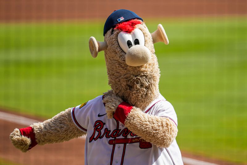 Oct 1, 2023; Cumberland, Georgia, USA; Atlanta Braves mascot Blooper shown on the field prior to the game against the Washington Nationals at Truist Park. Mandatory Credit: Dale Zanine-USA TODAY Sports