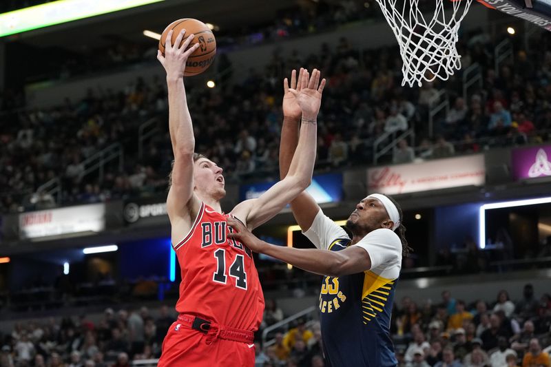 INDIANAPOLIS, INDIANA - MARCH 02: Matas Buzelis #14 of the Chicago Bulls attempts a shot while being guarded by Myles Turner #33 of the Indiana Pacers in the fourth quarter at Gainbridge Fieldhouse on March 02, 2025 in Indianapolis, Indiana. NOTE TO USER: User expressly acknowledges and agrees that, by downloading and or using this photograph, User is consenting to the terms and conditions of the Getty Images License Agreement. (Photo by Dylan Buell/Getty Images)