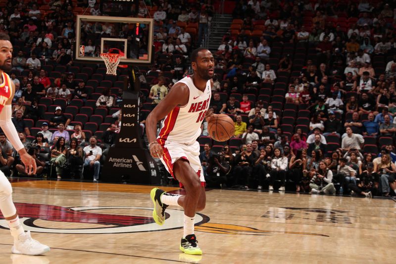 MIAMI, FL - OCTOBER 16: Alec Burks #18 of the Miami Heat dribbles the ball during the game against the Atlanta Hawks on October 16, 2024 at Miami-Dade Arena in Miami, Florida. NOTE TO USER: User expressly acknowledges and agrees that, by downloading and or using this Photograph, user is consenting to the terms and conditions of the Getty Images License Agreement. Mandatory Copyright Notice: Copyright 2024 NBAE (Photo by Issac Baldizon/NBAE via Getty Images)