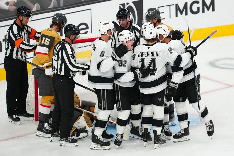 Oct 8, 2025; Las Vegas, Nevada, USA; Los Angeles Kings defenseman Brandt Clarke (92) celebrates with team mates after scoring a goal against the Vegas Golden Knights during the third period at T-Mobile Arena. Mandatory Credit: Stephen R. Sylvanie-Imagn Images