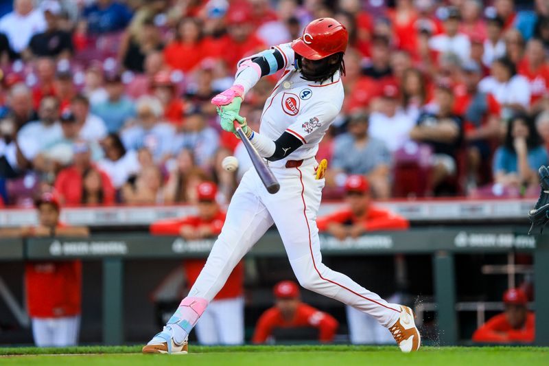 Jun 2, 2025; Cincinnati, Ohio, USA; Cincinnati Reds shortstop Elly De La Cruz (44) hits a RBI single in the first inning against the Milwaukee Brewers at Great American Ball Park. Mandatory Credit: Katie Stratman-Imagn Images