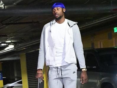 SAN FRANCISCO, CA - NOVEMBER 20: Jonathan Kuminga #00 of the Golden State Warriors arrives at the arena before the game against the Houston Rockets on November 20, 2023 at Chase Center in San Francisco, California. NOTE TO USER: User expressly acknowledges and agrees that, by downloading and or using this photograph, user is consenting to the terms and conditions of Getty Images License Agreement. Mandatory Copyright Notice: Copyright 2023 NBAE (Photo by Noah Graham/NBAE via Getty Images)