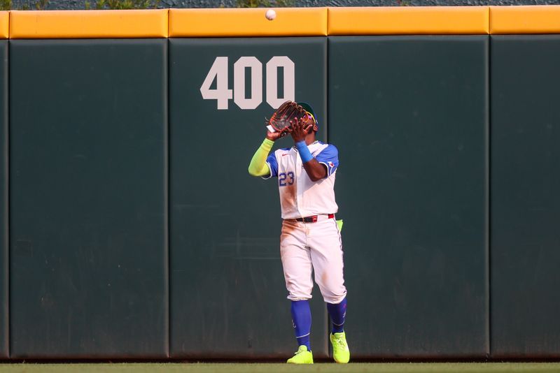 May 31, 2025; Atlanta, Georgia, USA; Atlanta Braves center fielder Michael Harris II (23) catches a fly ball against the Boston Red Sox in the ninth inning at Truist Park. Mandatory Credit: Brett Davis-Imagn Images