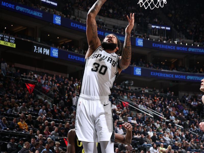 SALT LAKE CITY, UT - MARCH 27: Julian Champagnie #30 of the San Antonio Spurs shoots the ball during the game against the Utah Jazz on March 27, 2024 at Delta Center in Salt Lake City, Utah. NOTE TO USER: User expressly acknowledges and agrees that, by downloading and or using this Photograph, User is consenting to the terms and conditions of the Getty Images License Agreement. Mandatory Copyright Notice: Copyright 2024 NBAE (Photo by Melissa Majchrzak/NBAE via Getty Images)