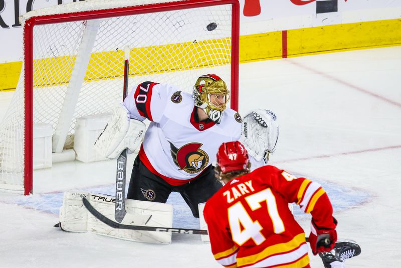 Jan 9, 2024; Calgary, Alberta, CAN; Calgary Flames center Connor Zary (47) scores a goal against Ottawa Senators goaltender Joonas Korpisalo (70) during the first period at Scotiabank Saddledome. Mandatory Credit: Sergei Belski-USA TODAY Sports