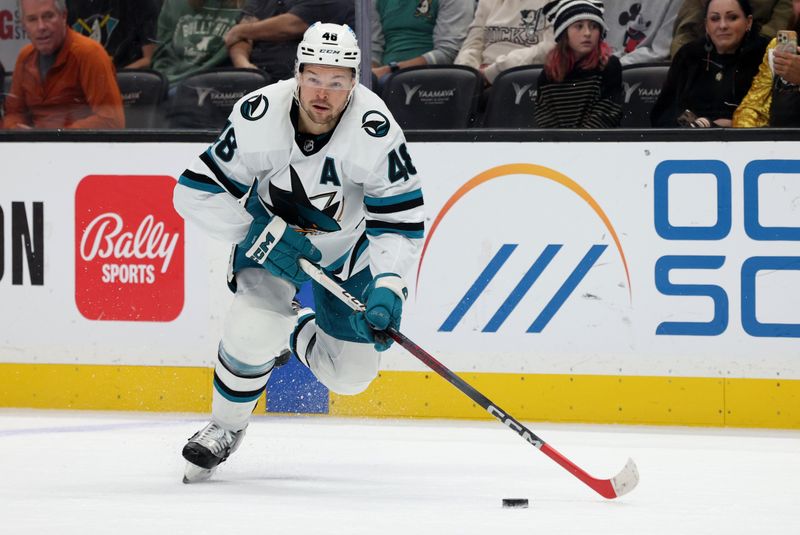 Nov 12, 2023; Anaheim, California, USA; San Jose Sharks center Tomas Hertl (48) skates with the puck during the first period against the Anaheim Ducks at Honda Center. Mandatory Credit: Jason Parkhurst-USA TODAY Sports