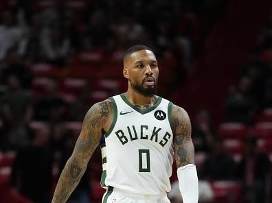 MIAMI, FLORIDA - NOVEMBER 28: Damian Lillard #0 of the Milwaukee Bucks dribbles the ball up the court against the Miami Heat in the first quarter during the NBA In-season Tournament game at Kaseya Center on November 28, 2023 in Miami, Florida. NOTE TO USER: User Expressly acknowledges and agrees that, by downloading and or using this photograh, User is consenting to the terms and conditions of the Getty Images License Agreement. (Photo by Rich Storry/Getty Images)