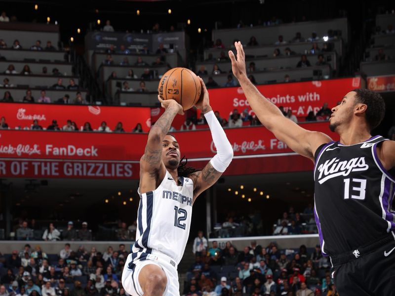 MEMPHIS, TN - DECEMBER 5: Ja Morant #12 of the Memphis Grizzlies shoots the ball during the game against the Sacramento Kings on December 5, 2024 at FedExForum in Memphis, Tennessee. NOTE TO USER: User expressly acknowledges and agrees that, by downloading and or using this photograph, User is consenting to the terms and conditions of the Getty Images License Agreement. Mandatory Copyright Notice: Copyright 2024 NBAE (Photo by Joe Murphy/NBAE via Getty Images)