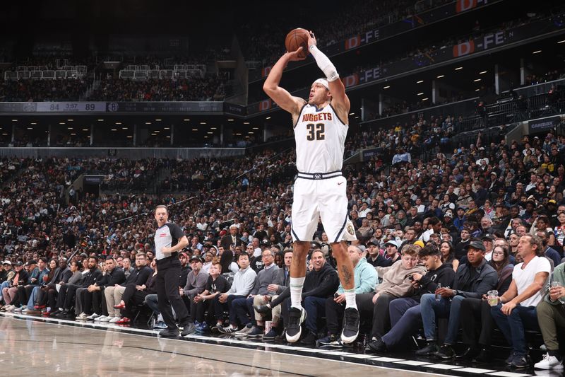 BROOKLYN, NY - OCTOBER 29: Aaron Gordon #32 of the Denver Nuggets shoots a three point basket during the game against the Brooklyn Nets on October 29, 2024 at Barclays Center in Brooklyn, New York. NOTE TO USER: User expressly acknowledges and agrees that, by downloading and or using this Photograph, user is consenting to the terms and conditions of the Getty Images License Agreement. Mandatory Copyright Notice: Copyright 2024 NBAE (Photo by Nathaniel S. Butler/NBAE via Getty Images)