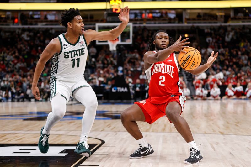 Mar 10, 2023; Chicago, IL, USA; Ohio State Buckeyes guard Bruce Thornton (2) drives to the basket against Michigan State Spartans guard A.J. Hoggard (11) during the first half at United Center. Mandatory Credit: Kamil Krzaczynski-USA TODAY Sports