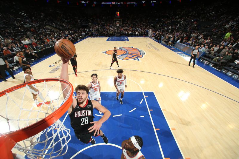 NEW YORK, NY - JANUARY 17: Alperen Sengun #28 of the Houston Rockets drives to the basket during the game against the New York Knicks on January 17, 2024 at Madison Square Garden in New York City, New York.  NOTE TO USER: User expressly acknowledges and agrees that, by downloading and or using this photograph, User is consenting to the terms and conditions of the Getty Images License Agreement. Mandatory Copyright Notice: Copyright 2024 NBAE  (Photo by Nathaniel S. Butler/NBAE via Getty Images)