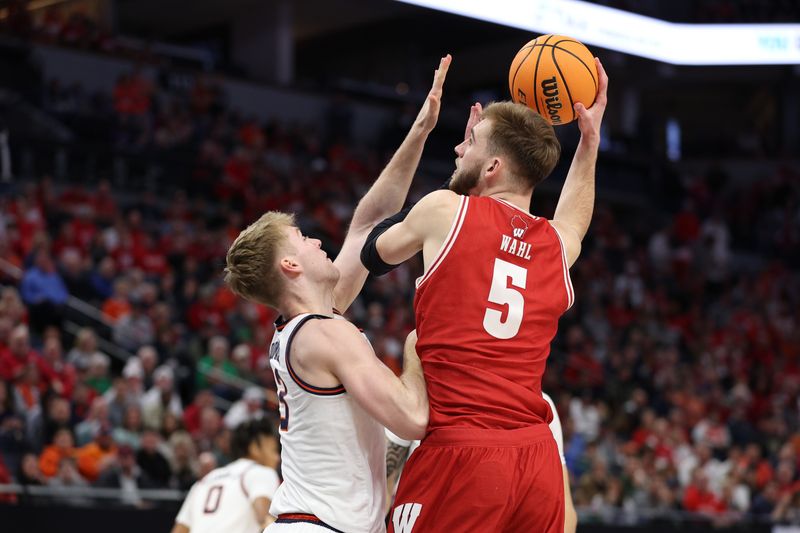 Mar 17, 2024; Minneapolis, MN, USA; Illinois Fighting Illini guard AJ Redd (5) plays the ball defend by Illinois Fighting Illini forward Marcus Domask (3) in the first half at Target Center. Mandatory Credit: Matt Krohn-USA TODAY Sports