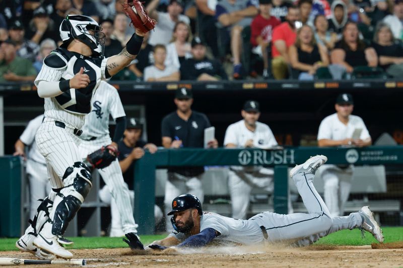 Aug 23, 2024; Chicago, Illinois, USA; Detroit Tigers outfielder Riley Greene (31) scores against the Chicago White Sox during the seventh inning at Guaranteed Rate Field. Mandatory Credit: Kamil Krzaczynski-USA TODAY Sports