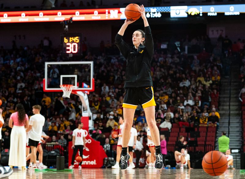 Feb 11, 2024; Lincoln, Nebraska, USA; Iowa Hawkeyes guard Caitlin Clark (22) warms up before the game against the Nebraska Cornhuskers at Pinnacle Bank Arena. Mandatory Credit: Dylan Widger-USA TODAY Sports