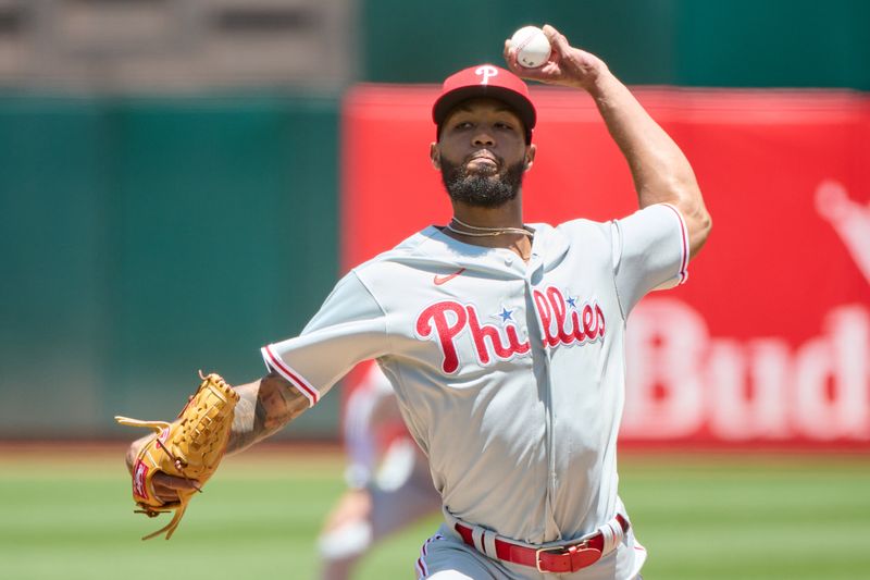 Jun 17, 2023; Oakland, California, USA; Philadelphia Phillies pitcher Cristopher Sanchez (61) throws a pitch against the Oakland Athletics during the first inning at Oakland-Alameda County Coliseum. Mandatory Credit: Robert Edwards-USA TODAY Sports