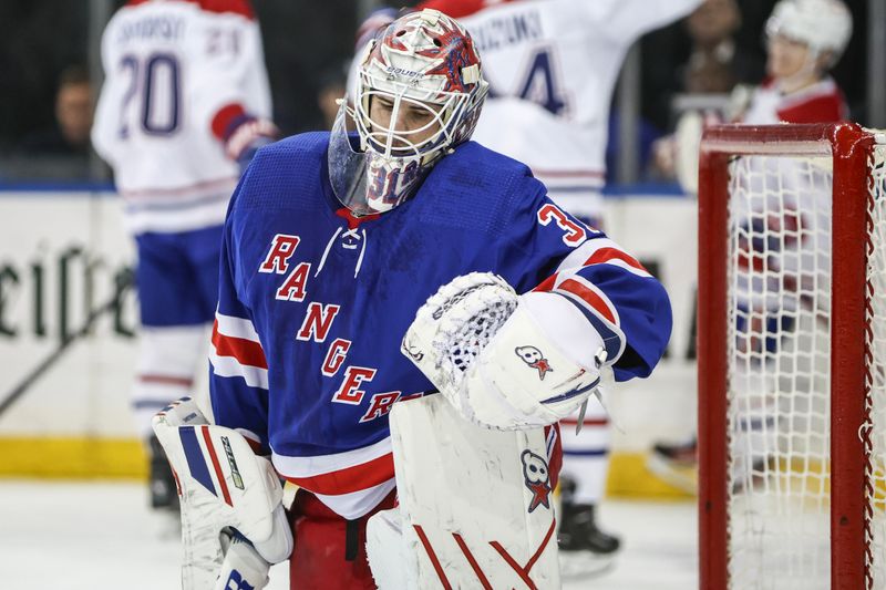 Apr 7, 2024; New York, New York, USA;  New York Rangers goaltender Igor Shesterkin (31) reacts after allowing a goal in the first period against the Montreal Canadiens at Madison Square Garden. Mandatory Credit: Wendell Cruz-USA TODAY Sports