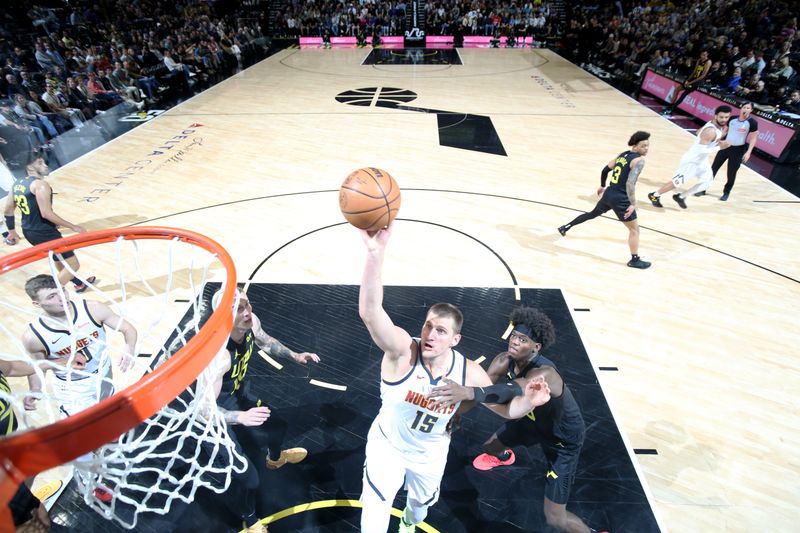 SALT LAKE CITY, UT - APRIL 9: Nikola Jokic #15 of the Denver Nuggets shoots the ball during the game against the Utah Jazz on April 9, 2024 at Delta Center in Salt Lake City, Utah. NOTE TO USER: User expressly acknowledges and agrees that, by downloading and or using this Photograph, User is consenting to the terms and conditions of the Getty Images License Agreement. Mandatory Copyright Notice: Copyright 2024 NBAE (Photo by Melissa Majchrzak/NBAE via Getty Images)