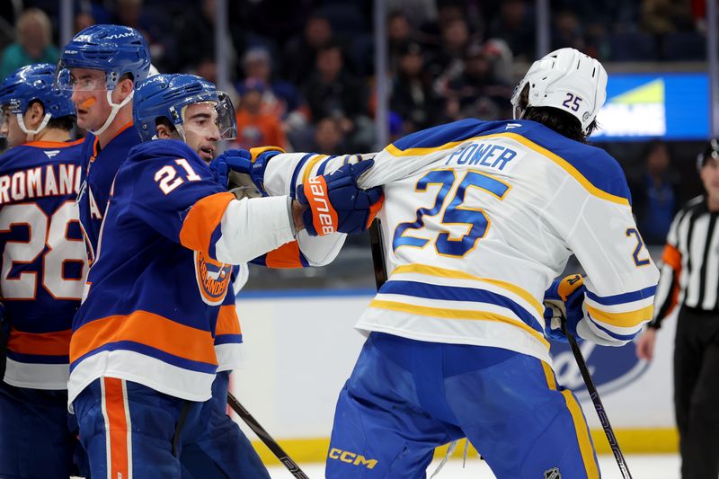 Nov 30, 2024; Elmont, New York, USA; New York Islanders center Kyle Palmieri (21) grabs Buffalo Sabres defenseman Owen Power (25) during the third period at UBS Arena. Mandatory Credit: Brad Penner-Imagn Images