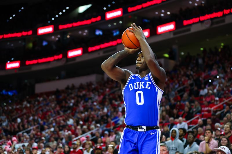 Jan 4, 2023; Raleigh, North Carolina, USA;  Duke Blue Devils forward Dariq Whitehead (0) shoots a three pointer during the second half against North Carolina State Wolfpack at PNC Arena. Mandatory Credit: Jaylynn Nash-USA TODAY Sports