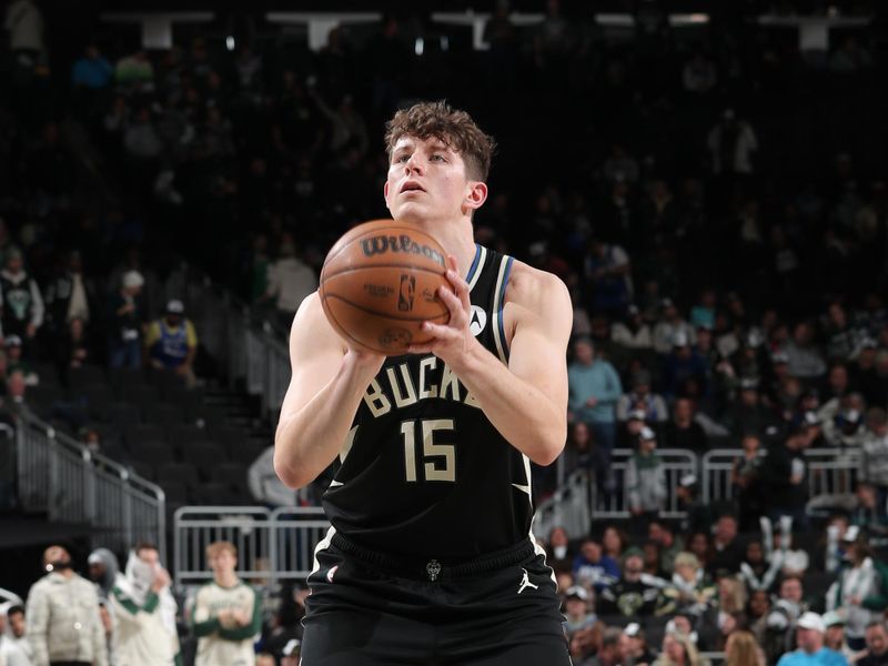 MILWAUKEE, WI - JANUARY 15: Liam Robbins #15 of the Milwaukee Bucks shoots a free throw during the game against the Orlando Magic on January 15, 2025 at Fiserv Forum Center in Milwaukee, Wisconsin. NOTE TO USER: User expressly acknowledges and agrees that, by downloading and or using this Photograph, user is consenting to the terms and conditions of the Getty Images License Agreement. Mandatory Copyright Notice: Copyright 2025 NBAE (Photo by Gary Dineen/NBAE via Getty Images).