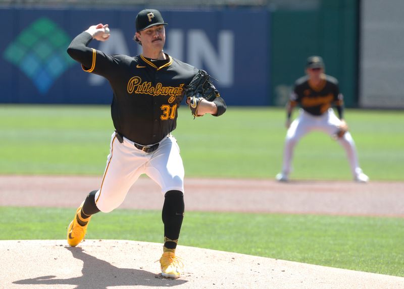 Aug 28, 2024; Pittsburgh, Pennsylvania, USA;  Pittsburgh Pirates starting pitcher Paul Skenes (30) delivers a pitch against the Chicago Cubs during the first inning at PNC Park. Mandatory Credit: Charles LeClaire-USA TODAY Sports