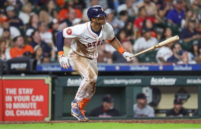 May 2, 2024; Houston, Texas, USA; Houston Astros shortstop Jeremy Pena (3) hits a triple during the sixth inning against the Cleveland Guardians at Minute Maid Park. Mandatory Credit: Troy Taormina-USA TODAY Sports