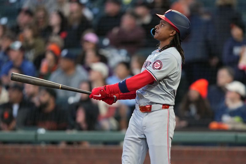 Apr 9, 2024; San Francisco, California, USA; Washington Nationals shortstop CJ Abrams (5) watches the flight of his home run during the third inning against the San Francisco Giants at Oracle Park. Mandatory Credit: Darren Yamashita-USA TODAY Sports