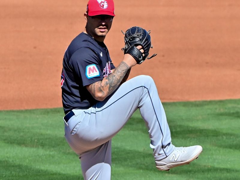 Feb 29, 2024; Tempe, Arizona, USA;  Cleveland Guardians pitcher Anthony Banda (43) throws in the fourth inning against the Cleveland Guardians during a spring training game at Tempe Diablo Stadium. Mandatory Credit: Matt Kartozian-USA TODAY Sports