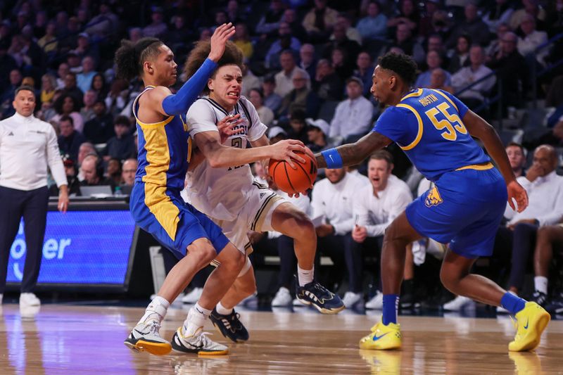 Jan 23, 2024; Atlanta, Georgia, USA; Georgia Tech Yellow Jackets guard Naithan George (2) drives on Pittsburgh Panthers guard Jaland Lowe (15) and forward Zack Austin (55) in the second half at McCamish Pavilion. Mandatory Credit: Brett Davis-USA TODAY Sports