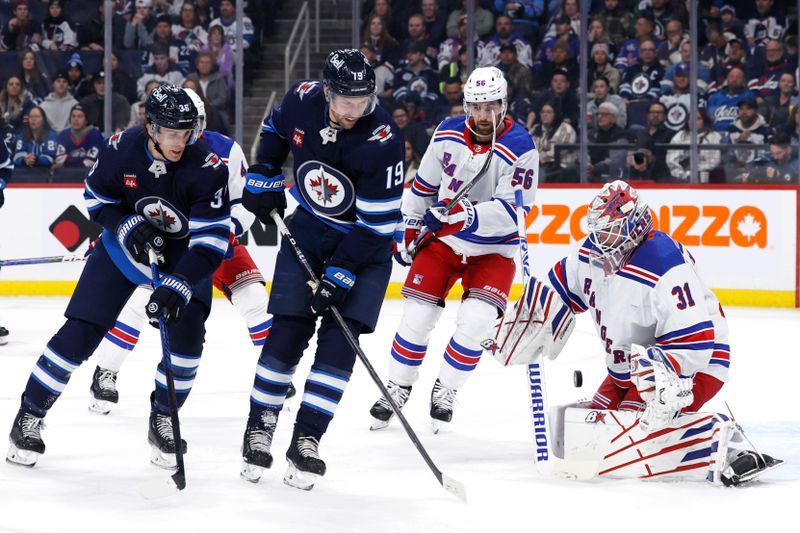 Oct 30, 2023; Winnipeg, Manitoba, CAN; New York Rangers goaltender Igor Shesterkin (31) blocks a tip in attempt from Winnipeg Jets center David Gustafsson (19) in the second period at Canada Life Centre. Mandatory Credit: James Carey Lauder-USA TODAY Sports