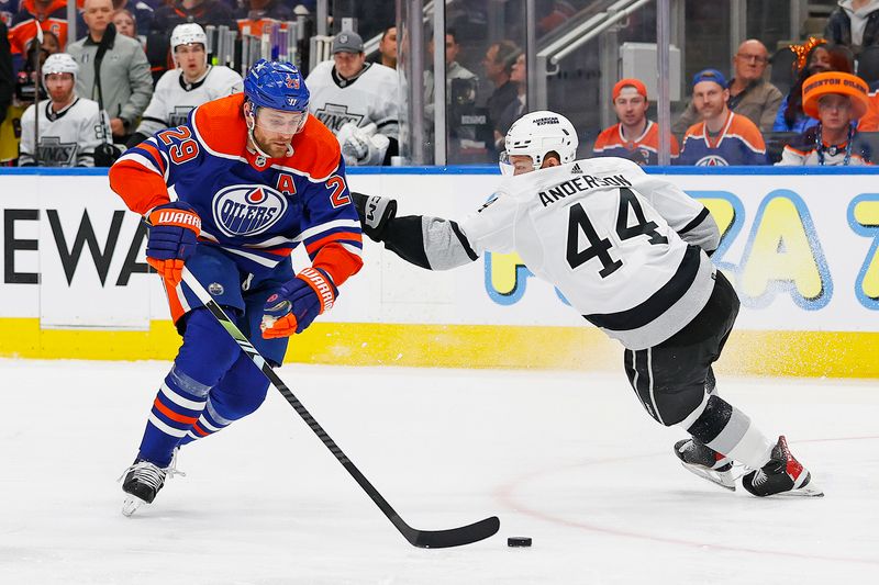 Apr 22, 2024; Edmonton, Alberta, CAN; Edmonton Oilers forward Leon Draisaitl (29) carries the puck around Los Angeles Kings defensemen Mikey Anderson (44) during the first period in game one of the first round of the 2024 Stanley Cup Playoffs at Rogers Place. Mandatory Credit: Perry Nelson-USA TODAY Sports