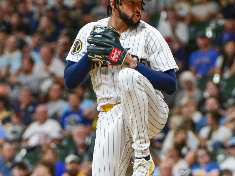 Sep 2, 2023; Milwaukee, Wisconsin, USA; Milwaukee Brewers pitcher Devin Williams (38) pitches against the Philadelphia Phillies in the ninth inning at American Family Field. Mandatory Credit: Benny Sieu-USA TODAY Sports