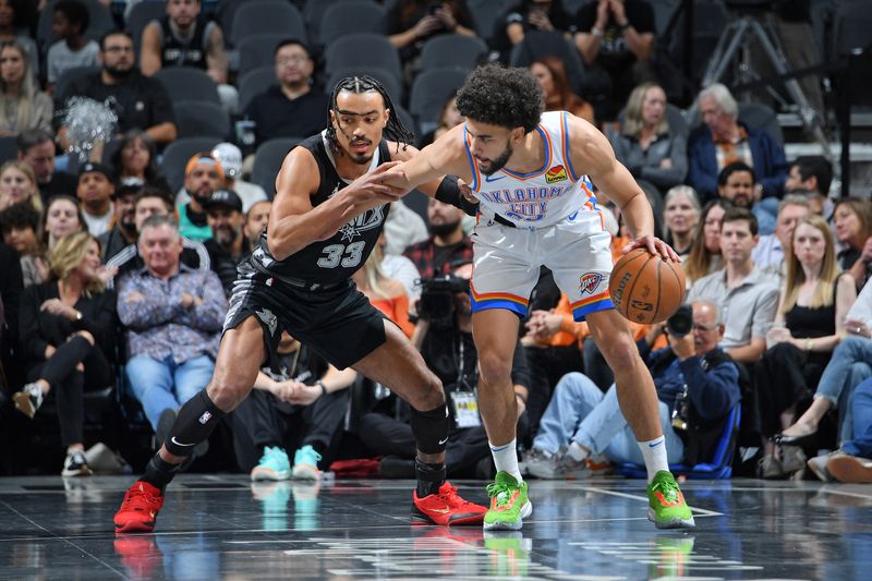 SAN ANTONIO, TX - NOVEMBER 19: Sidy Cissoko #25 of the San Antonio Spurs dribbles the ball during the game against the Oklahoma City Thunder during the Emirates NBA Cup game on November 19, 2024 at the Frost Bank Center in San Antonio, Texas. NOTE TO USER: User expressly acknowledges and agrees that, by downloading and or using this photograph, user is consenting to the terms and conditions of the Getty Images License Agreement. Mandatory Copyright Notice: Copyright 2024 NBAE (Photos by Michael Gonzales/NBAE via Getty Images)