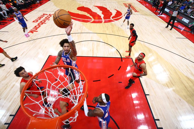 TORONTO, CANADA - MARCH 31: Kelly Oubre Jr. #9 of the Philadelphia 76ers drives to the basket during the game against the Toronto Raptors on March 31, 2024 at the Scotiabank Arena in Toronto, Ontario, Canada.  NOTE TO USER: User expressly acknowledges and agrees that, by downloading and or using this Photograph, user is consenting to the terms and conditions of the Getty Images License Agreement.  Mandatory Copyright Notice: Copyright 2024 NBAE (Photo by Vaughn Ridley/NBAE via Getty Images)